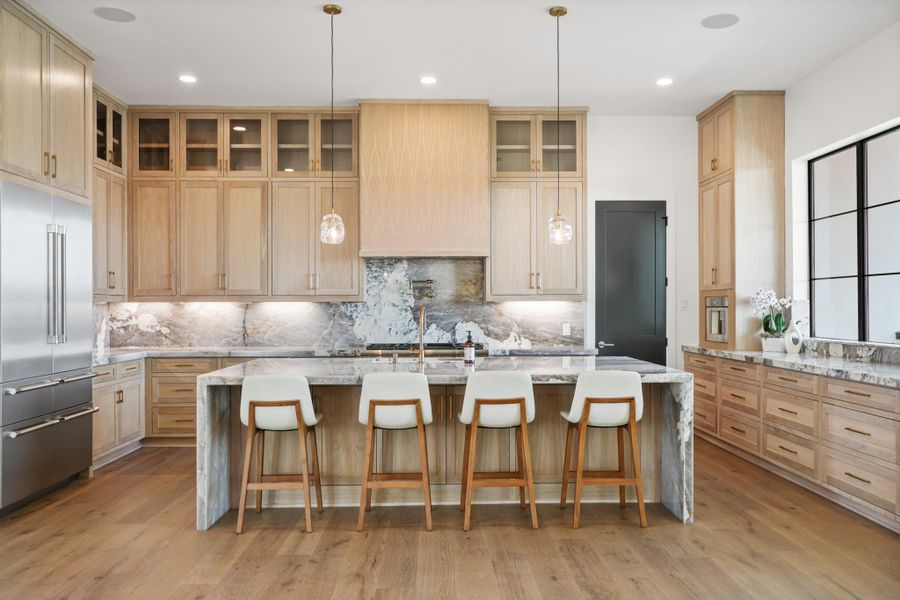 One of a kind luxurious chef's kitchen, with not one, but TWO gas ranges. All Thermador appliances. Custom, made on site, white oak kitchen cabinetry. One of a kind luxurious chef's kitchen, with not one, but TWO gas ranges. All Thermador appliances. Custom, made on site, white oak kitchen cabinetry.