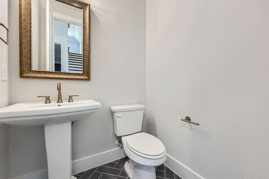 Bathroom with toilet and sink