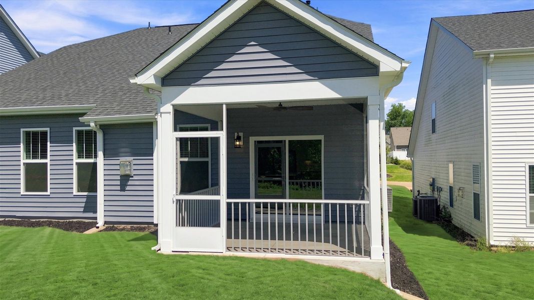 Exclusive rear covered porch with accomplished detail and elevated outdoor living potential by DRB Homes