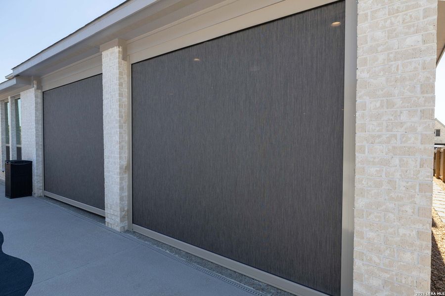 Exterior details and patio area of a home in Kallison Ranch, San Antonio (Image 28).