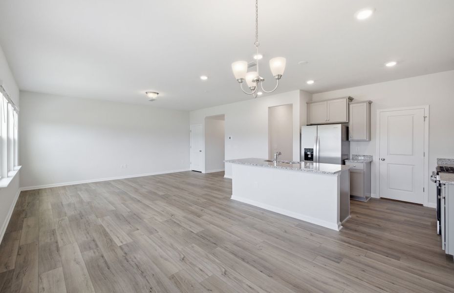 Spacious, unfurnished interior of a new home in Saunders Farm, Willow Spring (Image 23).