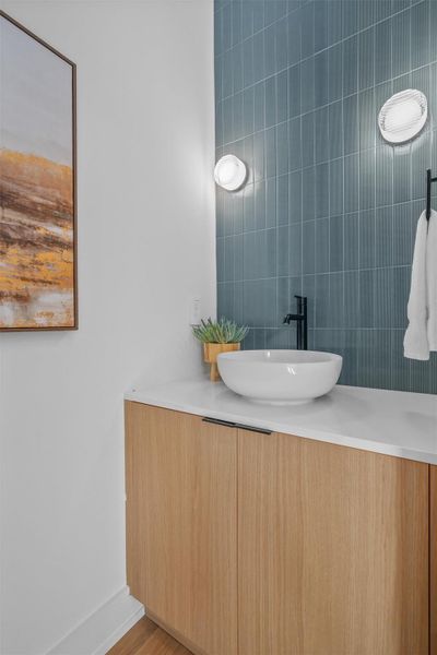 There's an impressive guest bathroom on the main level. There's an impressive guest bathroom on the main level.