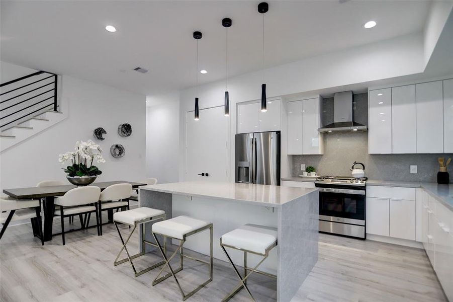 Open-concept kitchen and dining area.