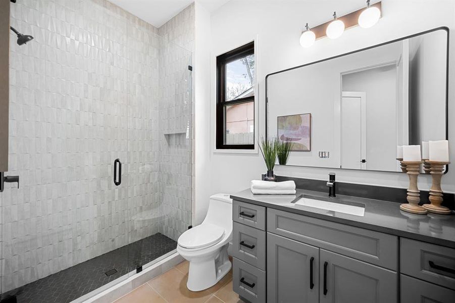 Experience modern splendor in the guest baths, where sleek fixtures, statement tiles, and innovative finishes redefine the concept of guest bathroom luxury