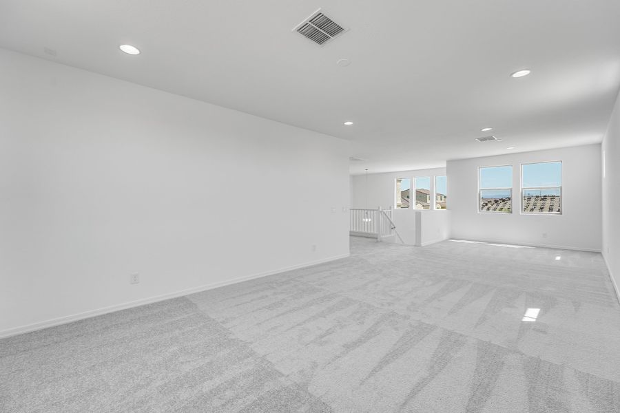 Representative unfurnished interior of a home built from the Kingston by Taylor Morrison in Combs Ranch, Queen Creek (Image 21).