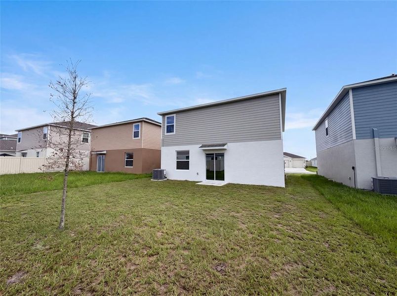 Exterior details and patio area of a home in Ranches at Lake Mcleod, Eagle Lake (Image 4).
