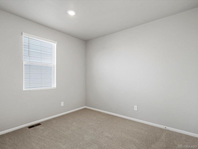 Spacious, unfurnished interior of a new home in Poudre Heights: The Lakes Collection, Windsor (Image 10).