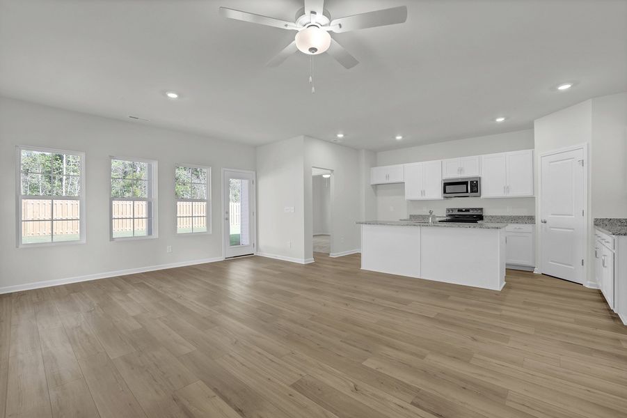 Spacious, unfurnished interior of a new home in River Tide Farms, Bolivia (Image 13).