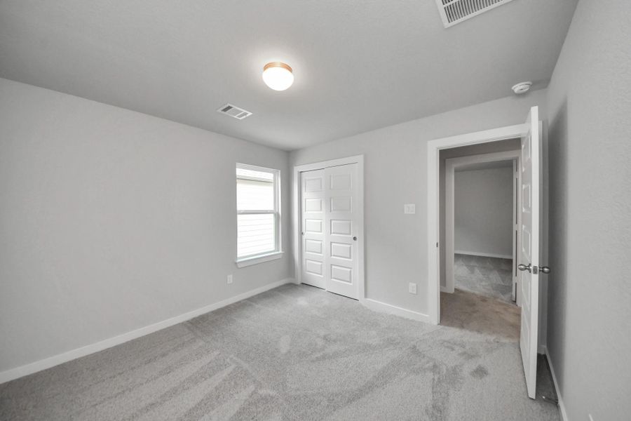 Generously sized secondary bedrooms featuring spacious closets, soft and inviting carpeting underfoot, large windows allowing plenty of natural light, and the added touch of privacy blinds for your personal retreat. Generously sized secondary bedrooms featuring spacious closets, soft and inviting carpeting underfoot, large windows allowing plenty of natural light, and the added touch of privacy blinds for your personal retreat.