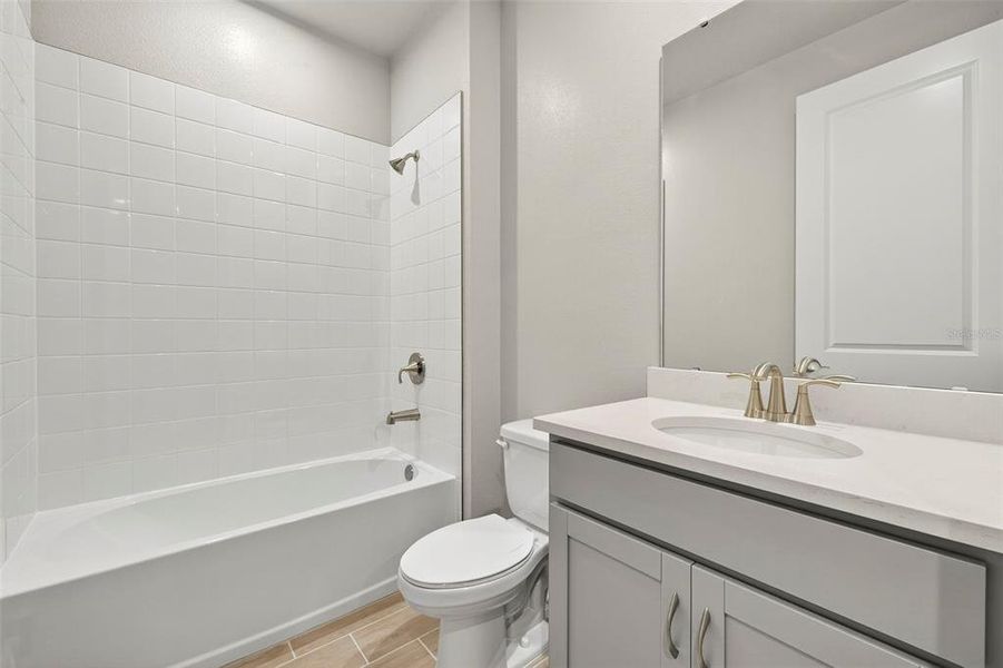 Furnished interior view inside a new home in Windwater, Parrish (Image 6).