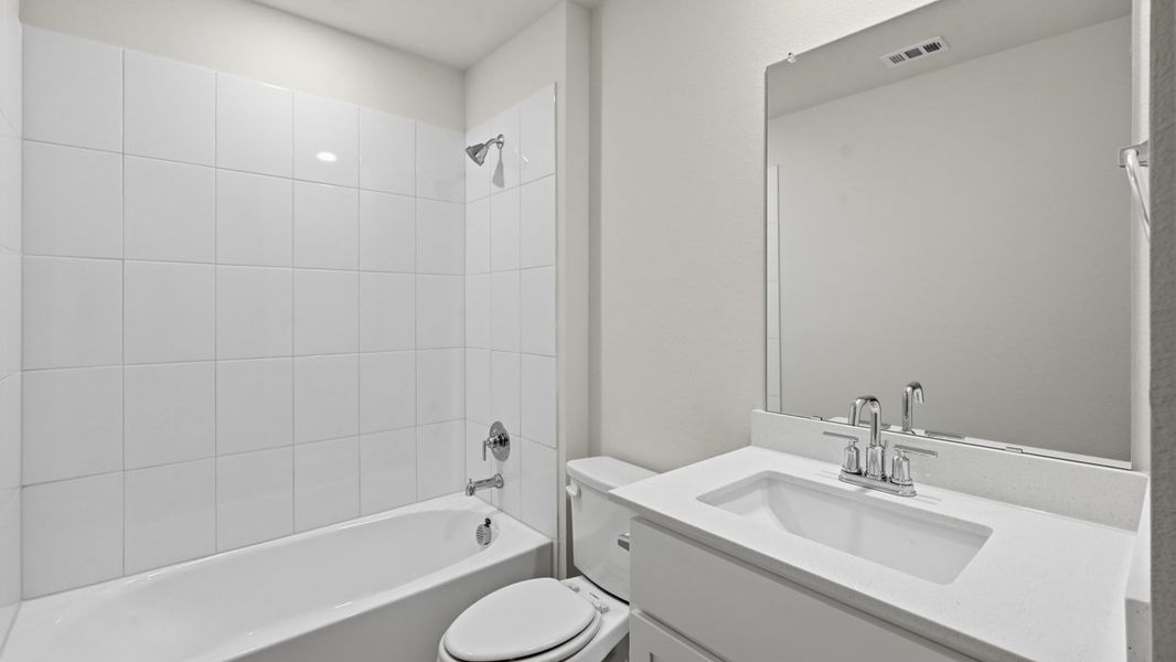 Representative furnished interior of a home built from the Jackson by D.R. Horton in Silverado, Aubrey (Image 7).