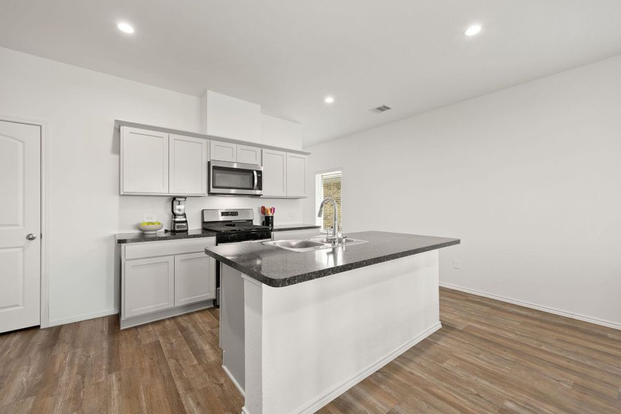Furnished interior view inside a new home in Breckenridge Forest, Spring (Image 9).