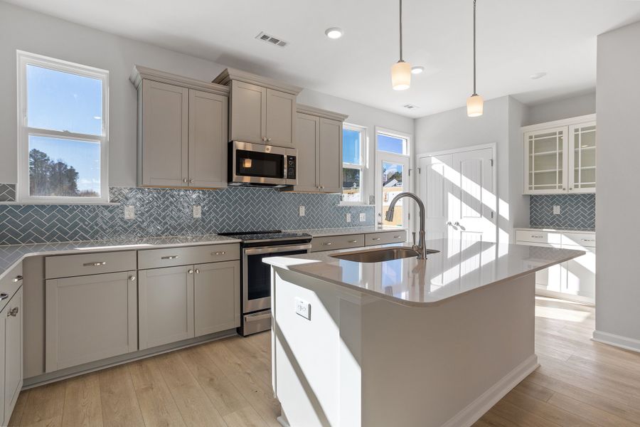 Furnished interior view inside a new home in Renaissance at White Oak, Garner (Image 8).