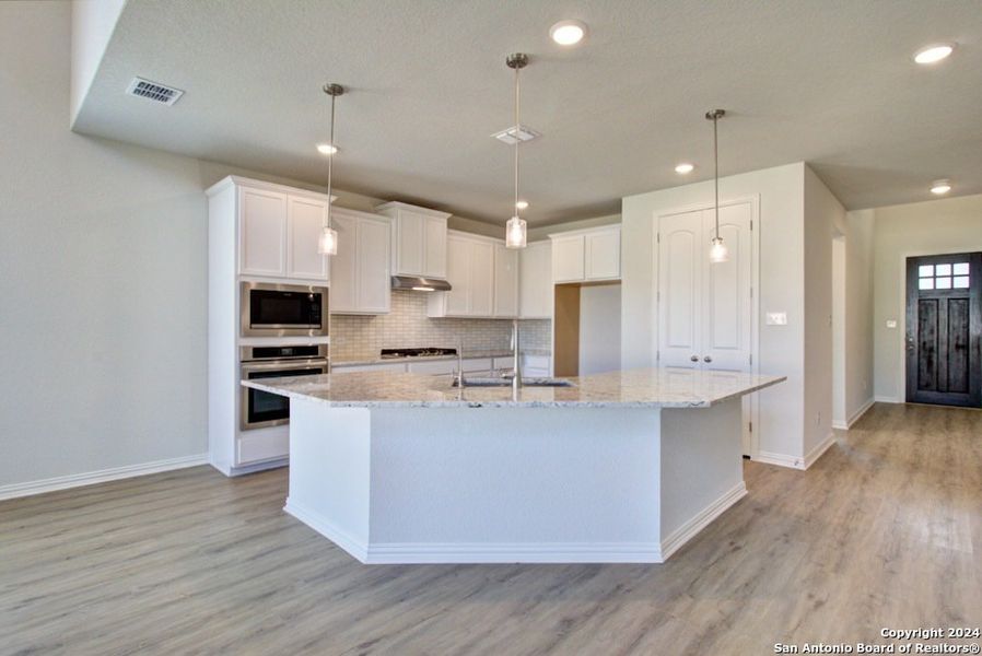 Furnished interior view inside a new home in Veranda, San Antonio (Image 11).