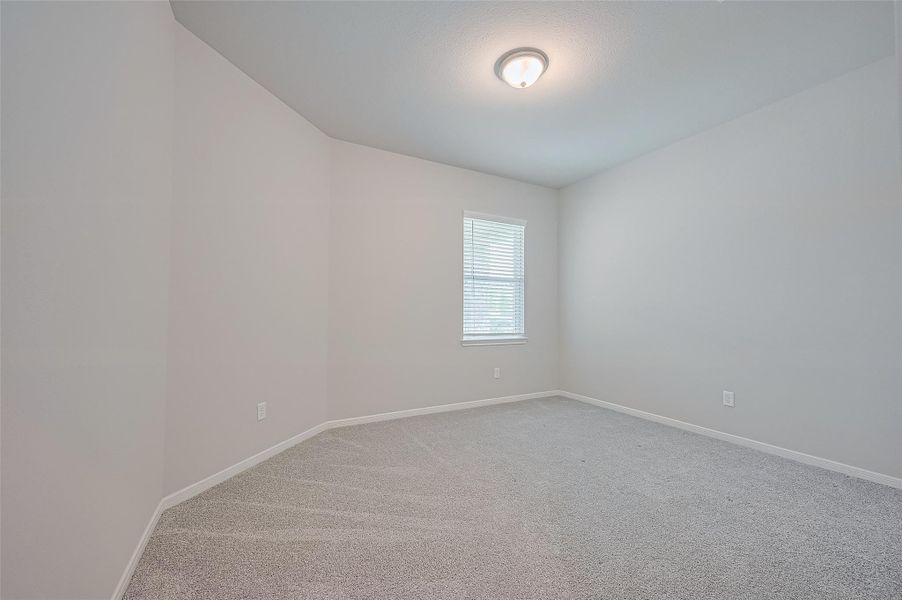 Spacious, unfurnished interior of a new home in Sunterra, Katy (Image 35).