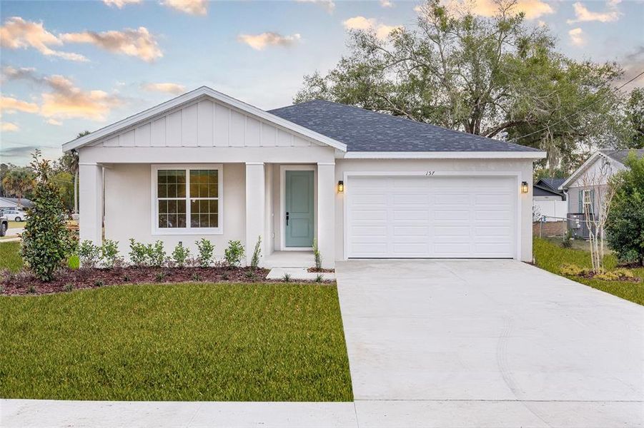 Front exterior of a new home in , Debary, FL, highlighting curb appeal (Image 17).