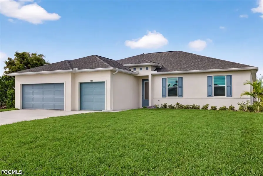 Front exterior of a new home in Cape Coral, Cape Coral, FL, highlighting curb appeal (Image 2). Front exterior of a new home in Cape Coral, Cape Coral, FL, highlighting curb appeal (Image 2).
