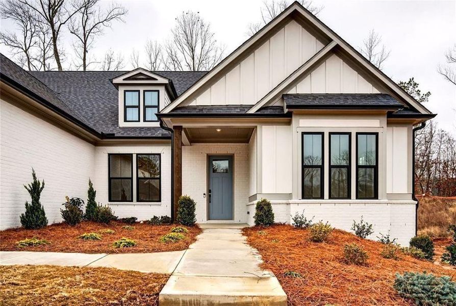 Front exterior of a new home in , Cumming, GA, highlighting curb appeal (Image 27).