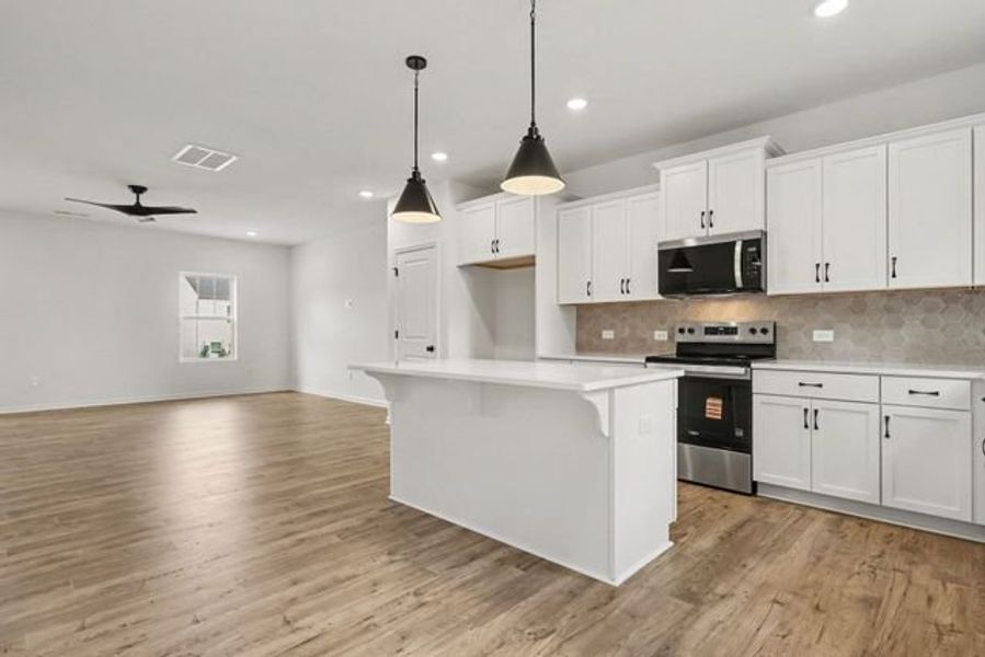 Representative furnished interior of a home built from the Darlow TH by True Homes in Penley Place Townhomes, Clover (Image 5). Representative furnished interior of a home built from the Darlow TH by True Homes in Penley Place Townhomes, Clover (Image 5).
