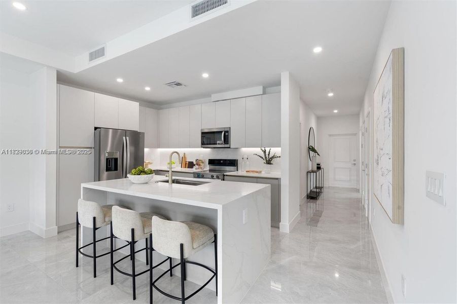 Furnished interior view inside a new home in , Coral Springs (Image 18).