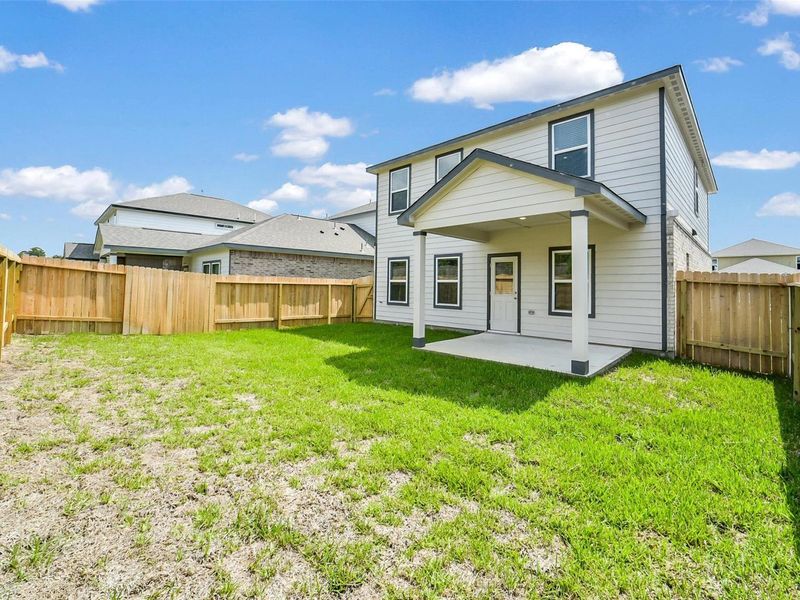 Exterior details and patio area of a home in Lakes at Black Oak, Magnolia (Image 23). Exterior details and patio area of a home in Lakes at Black Oak, Magnolia (Image 23).