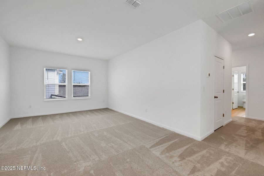 Spacious, unfurnished interior of a new home in TrailMark, St. Augustine (Image 38).