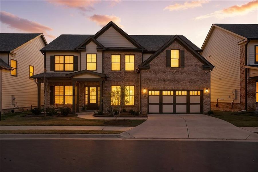 Front exterior of a new home in , Sugar Hill, GA, highlighting curb appeal (Image 17). Front exterior of a new home in , Sugar Hill, GA, highlighting curb appeal (Image 17).