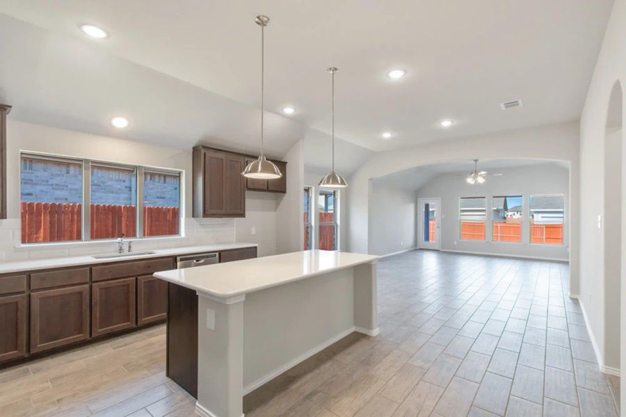 Kitchen to Family Room | Concept 1958 at Redden Farms - Classic Series in Midlothian, TX by Landsea Homes