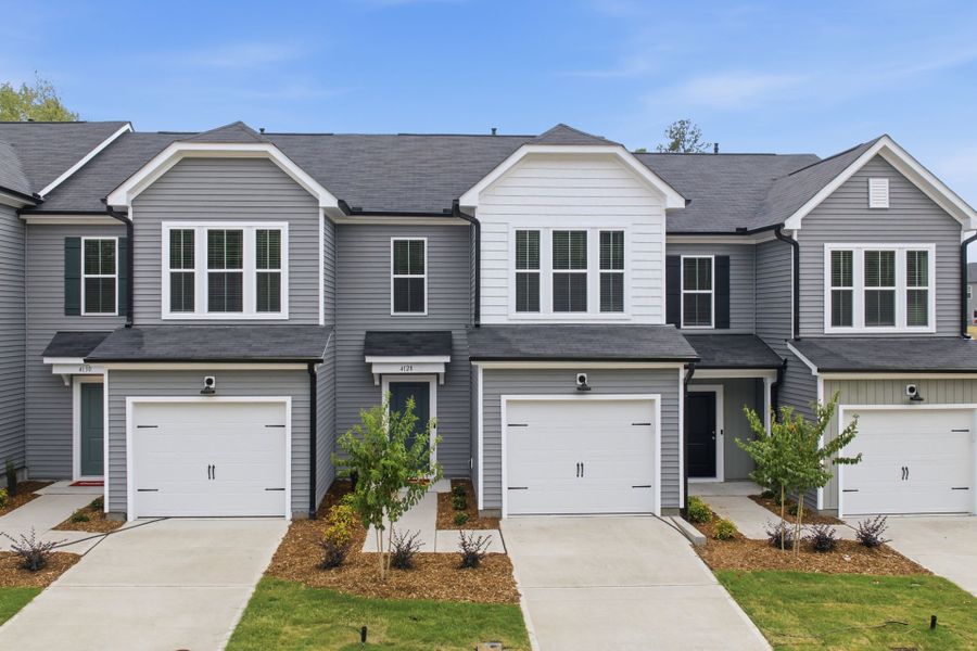 Front exterior of a new home in Carpenter Falls, Durham, NC, highlighting curb appeal (Image 16). Front exterior of a new home in Carpenter Falls, Durham, NC, highlighting curb appeal (Image 16).