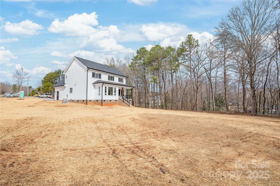 Front exterior of a new home in , Hickory, NC, highlighting curb appeal (Image 1).