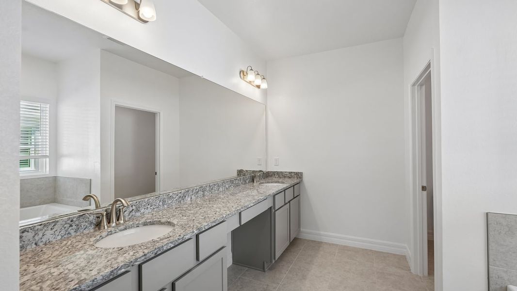 Furnished interior view inside a new home in Heritage Station, Punta Gorda (Image 9).