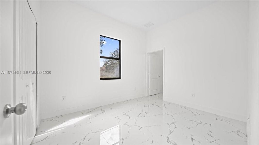 Spacious, unfurnished interior of a new home in , Lehigh Acres (Image 15).