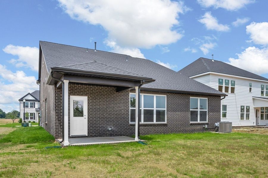 Exterior details and patio area of a home in Woods Crossing, Gallatin (Image 29).