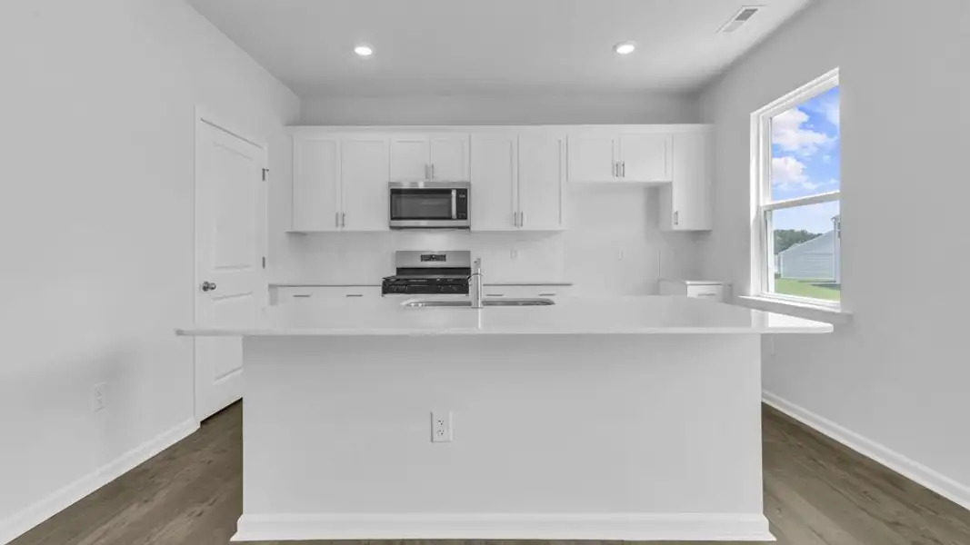 Furnished interior view inside a new home in The Preserve at Kinsley, Jamestown (Image 3).