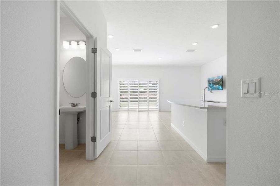 Furnished interior in a model home at The Townhomes at Azario Lakewood Ranch in Bradenton (Image 12).