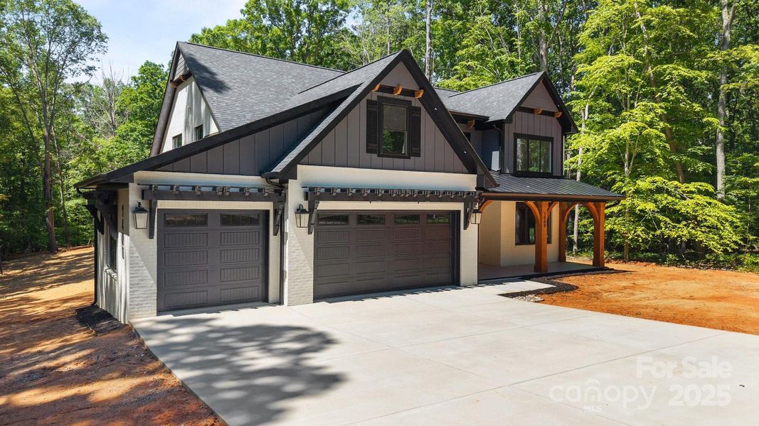 Front exterior of a new home in , Waxhaw, NC, highlighting curb appeal (Image 1).