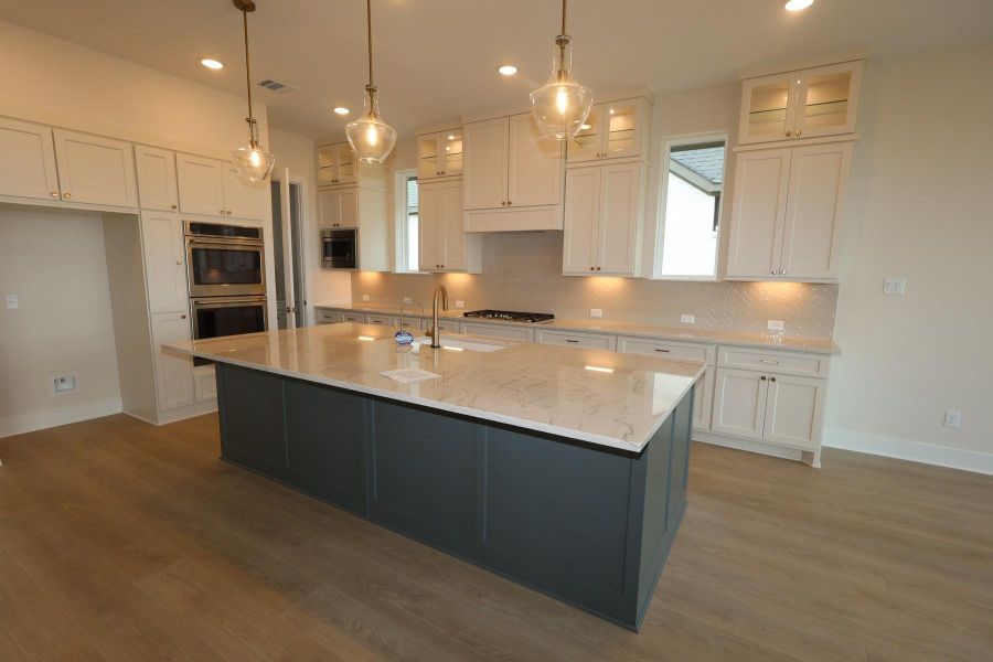 Furnished interior view inside a new home in Dunham Pointe, Cypress (Image 6).