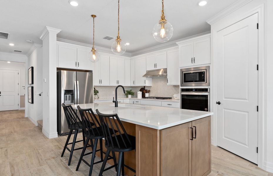 Furnished interior view inside a new home in Parkview Reserve, Orlando (Image 5).