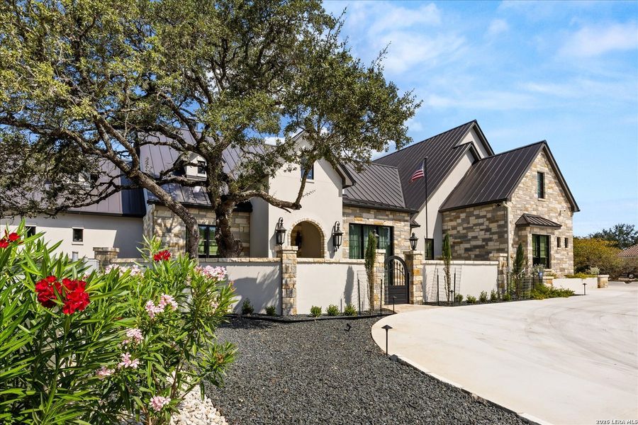 Front exterior of a new home in , Fair Oaks Ranch, TX, highlighting curb appeal (Image 22).