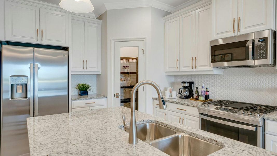 Furnished interior view inside a new home in SkySail Real Estate and Homes for Sale in Naples, FL - Neal Communities, Naples (Image 14).