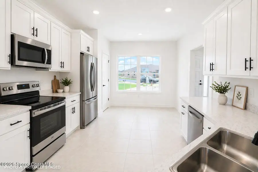 Furnished interior view inside a new home in St. John's Preserve, Palm Bay (Image 5).