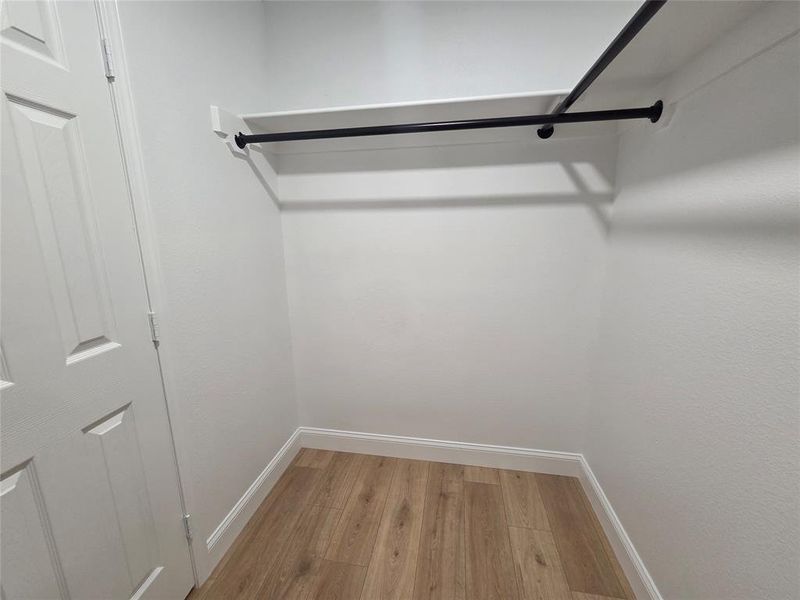 Primary Walk-In Closet. Primary Walk-In Closet.