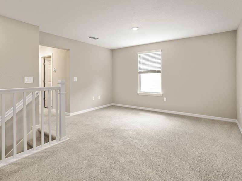 Upstairs, a loft provides desirable flex-use space - Aria bungalow by Highland Homes