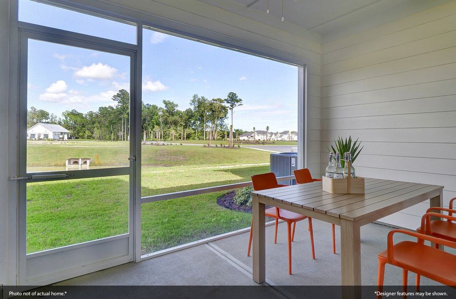 Exterior details and patio area of a home in Ovation at Sweetbrier, Durham (Image 2).