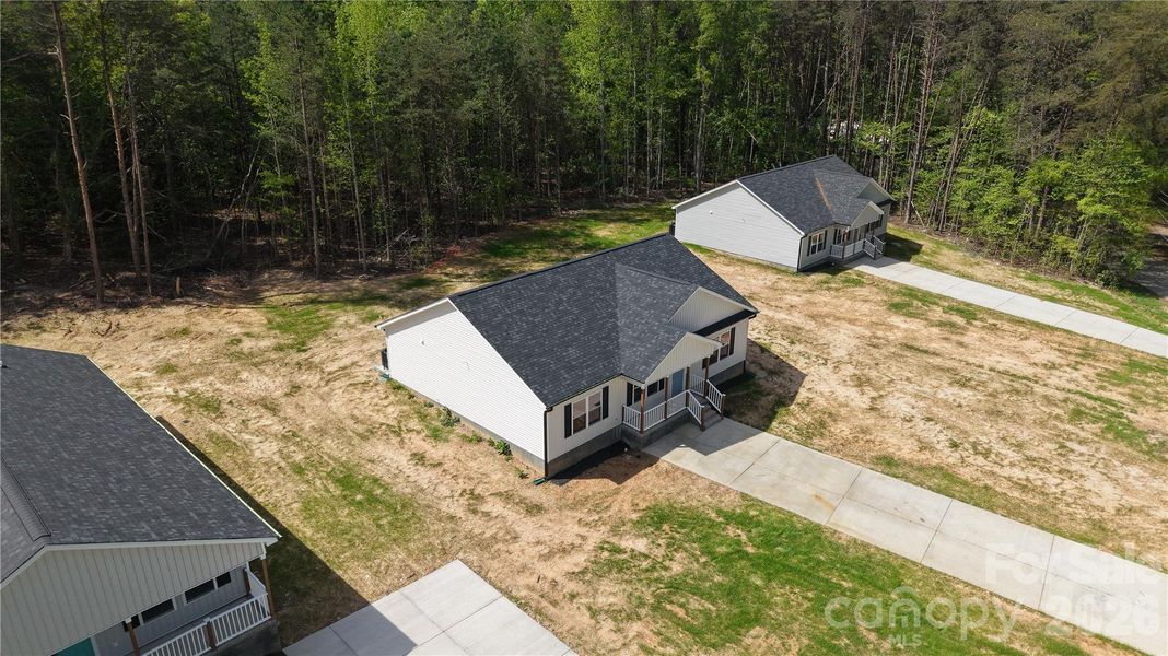 Front exterior of a new home in , Clover, SC, highlighting curb appeal (Image 2).