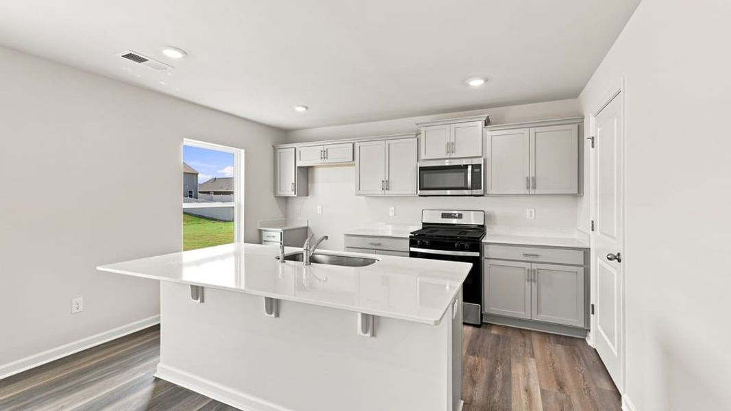 Furnished interior view inside a new home in Bentley Park, Greenwood (Image 8).