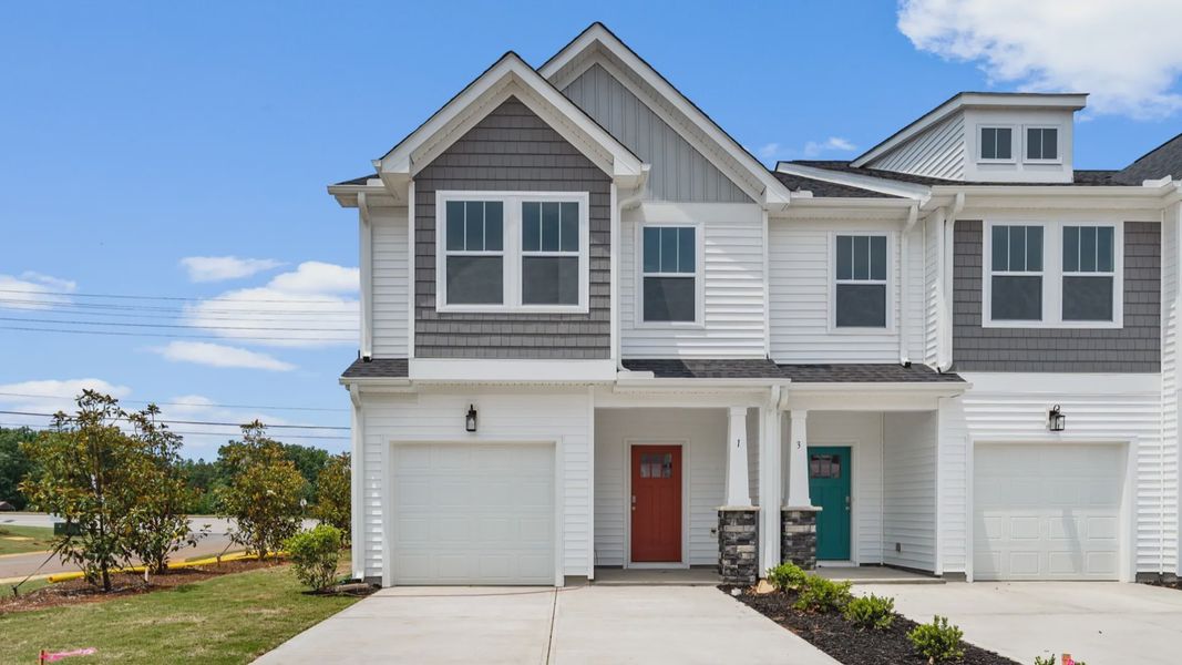Luxe 2 story townhomes with garage,  elevated ceilings, walk-in closets, & 9-foot kitchen island near Downtown Greenville, SC