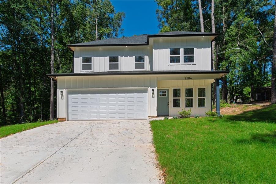 Front exterior of a new home in , Decatur, GA, highlighting curb appeal (Image 20).