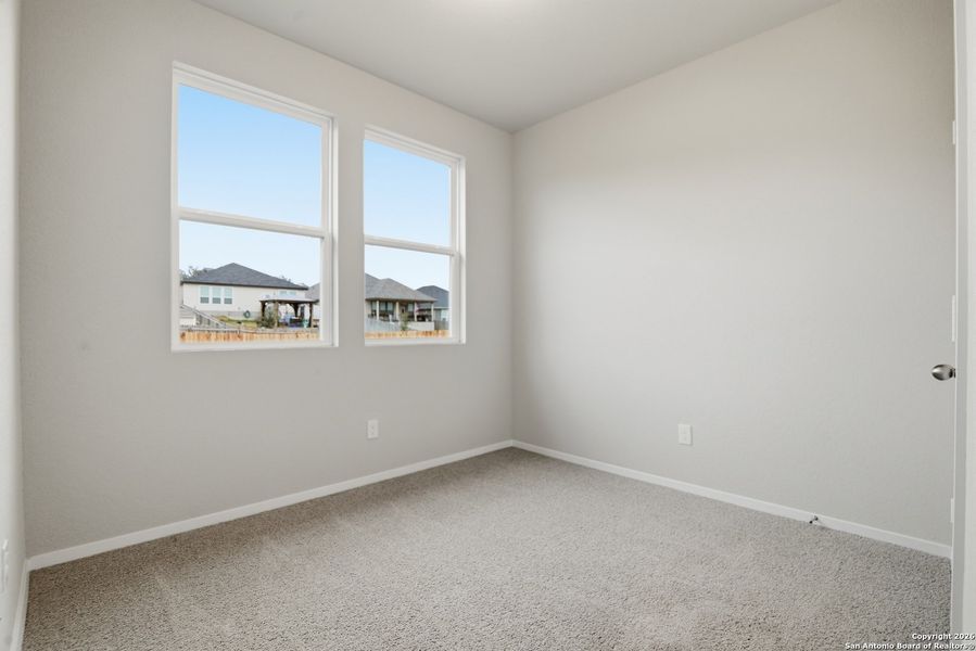 Spacious, unfurnished interior of a new home in Hunters Ranch, San Antonio (Image 29).