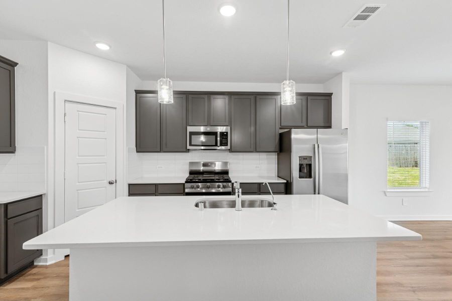Furnished interior view inside a new home in Pinewood at Grand Texas, New Caney (Image 11).